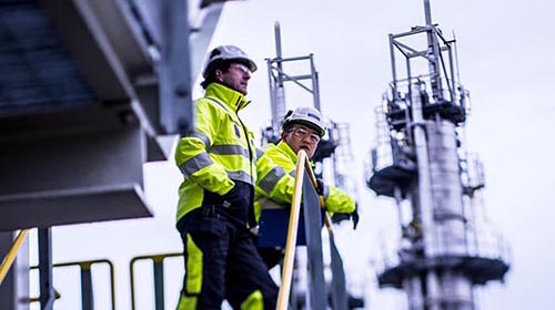 oil refinery workers discussing outside small.jpg